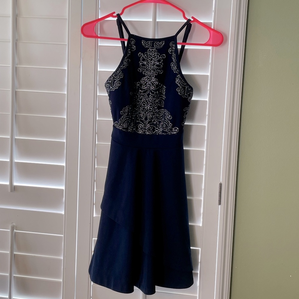 Navy Blue Homecoming or party dress. Worn 1x. Bought at Macy’s Size 0